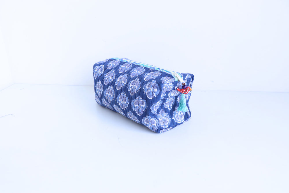 Blue floral-patterned pouch with a zipper on a white background