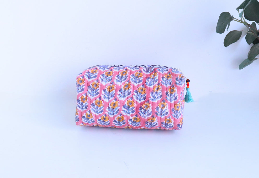 Custom block print cosmetic bag open view showing zip closure and lined interior, personalized with embroidered initials