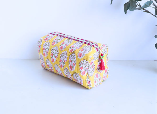 Hand block printed large cosmetic bag in yellow floral design by Kari by Kriti