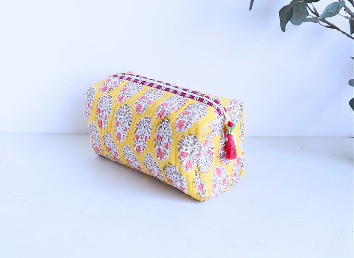 Hand block printed large cosmetic bag in yellow floral design by Kari by Kriti