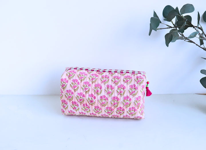 Close-up of booti block print motifs on peach cotton cosmetic pouch, Kari by Kriti