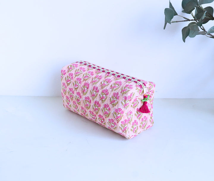 Hand block printed peach booti large cosmetic bag by Kari by Kriti, flat lay