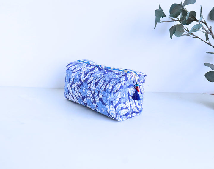 Hand block printed large cosmetic bag in light and dark blue floral design by Kari by Kriti