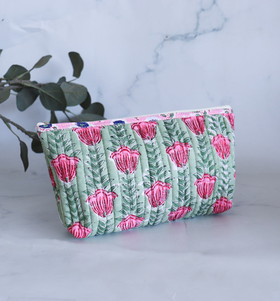 Quilted block print pencil pouch in blue floral pattern with hand-embroidered custom name, zip closure, handmade in India