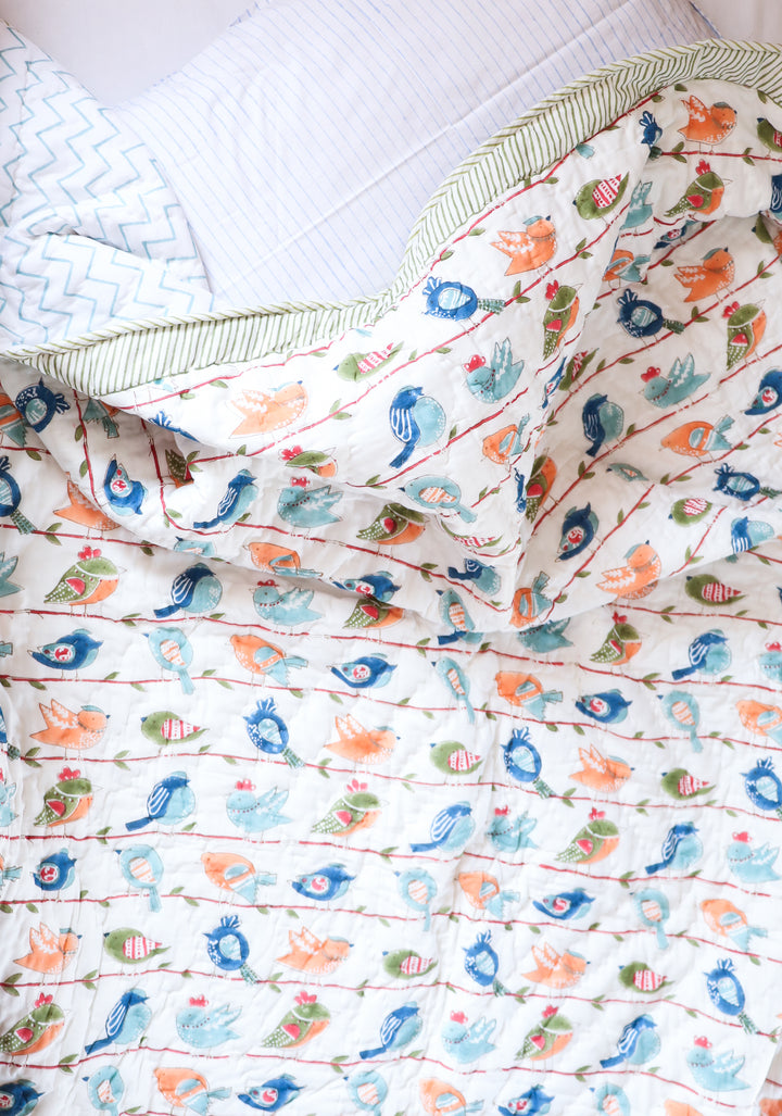 Personalized Cheerful Birdy hand block printed kids AC quilt in single bed size by Kari by Kriti