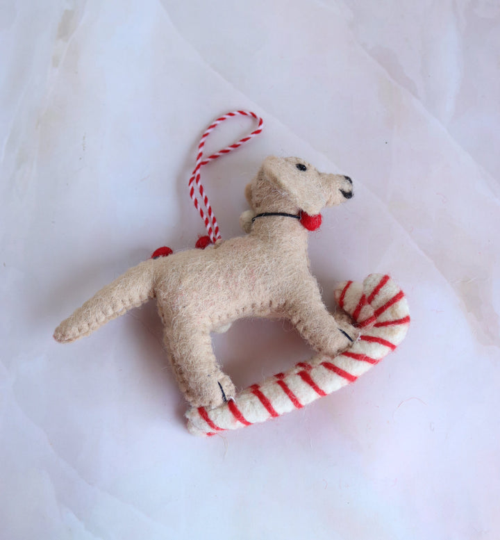 Bruno on Skis felt dog Christmas ornament, side view showing the hanging loop