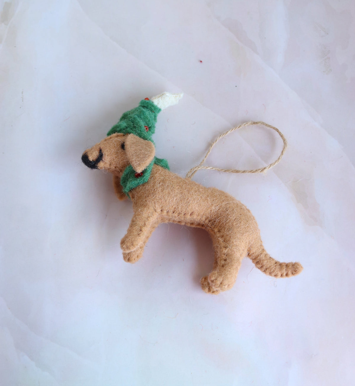 Coco the Spaniel handmade dog ornament with green elf hat, front view
