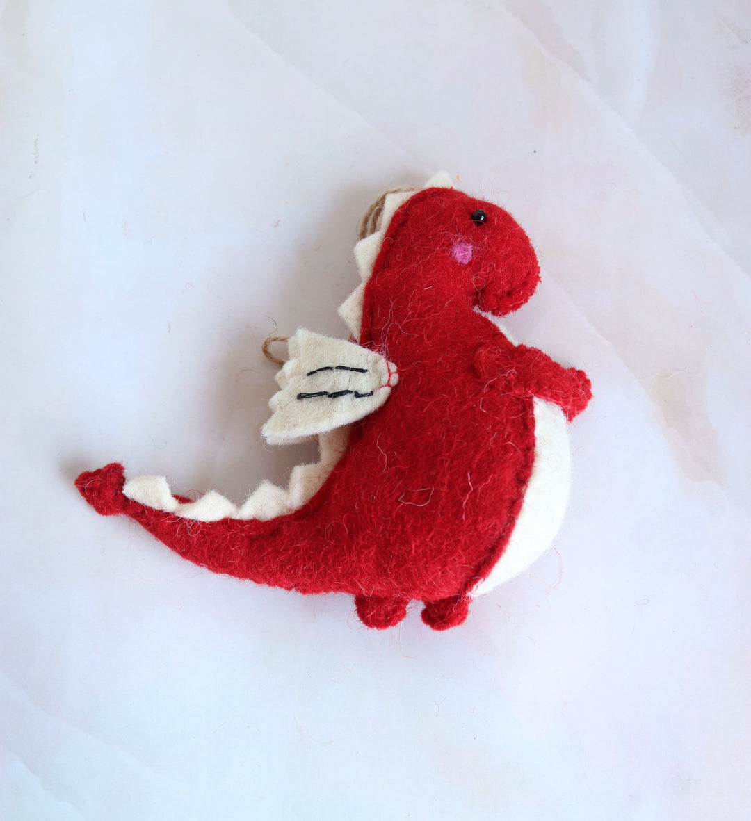 Sparky the Red Dragon felt Christmas ornament, side view showing the wings
