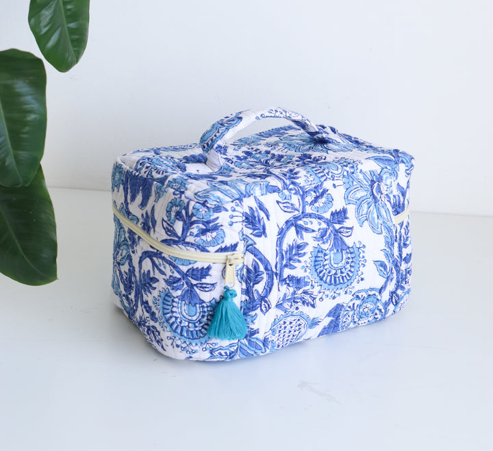 Handcrafted blue floral vanity bag open view showing interior space, block printed makeup case by Kari by Kriti