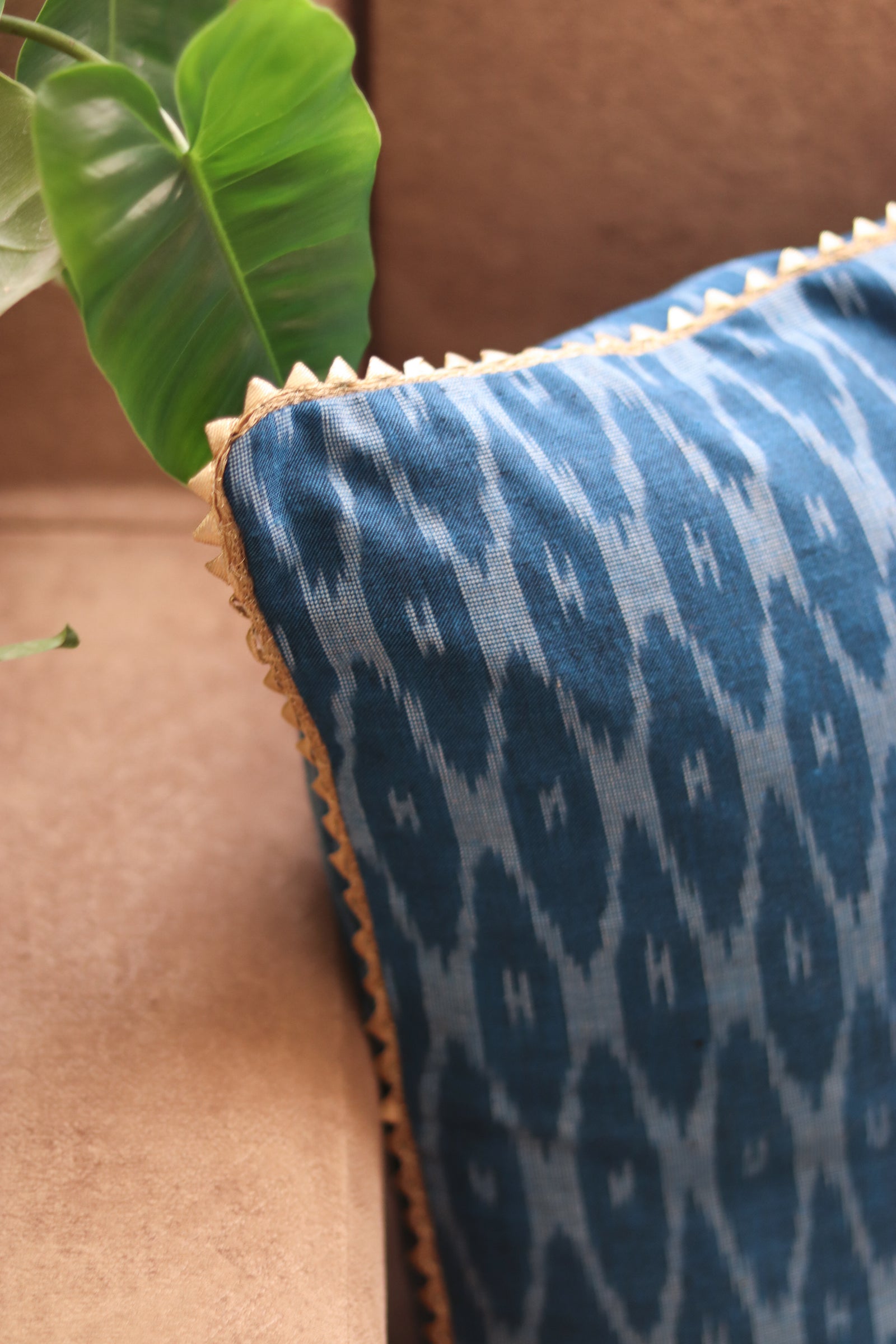 Teal festive handloom ikat cushion cover with trim, 16x16 inches, by Kari by Kriti
