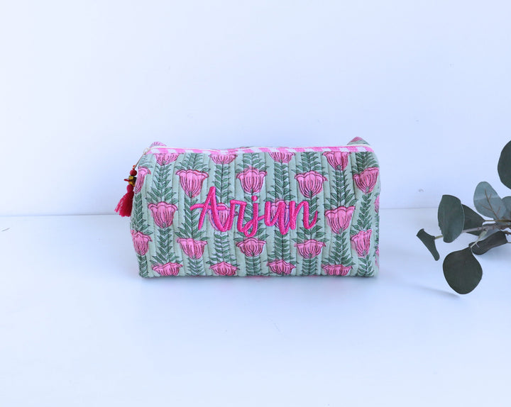 Large pouch with pink floral pattern and &