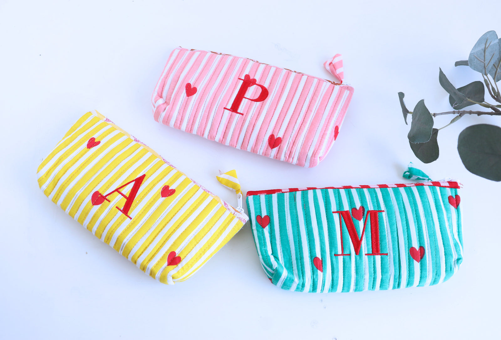 Heart print quilted pencil pouch with embroidered initials
