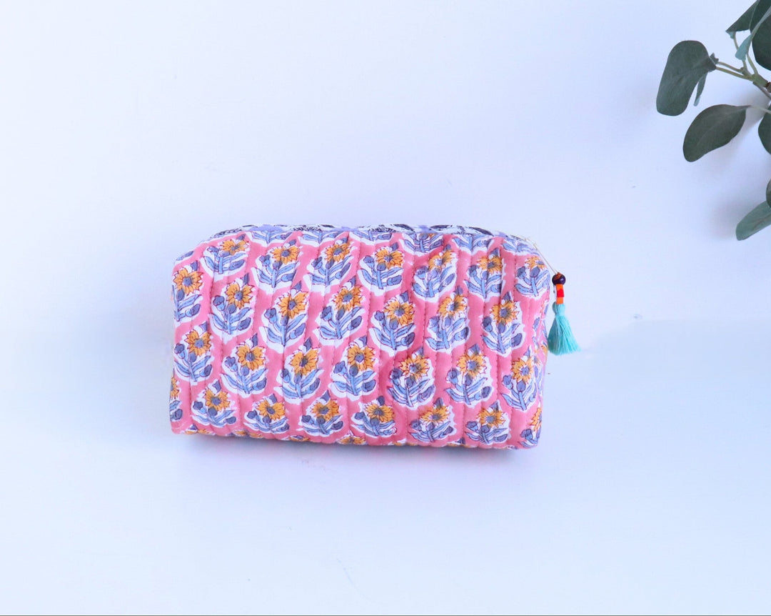 Custom block print cosmetic bag open view showing zip closure and lined interior, personalized with embroidered initials