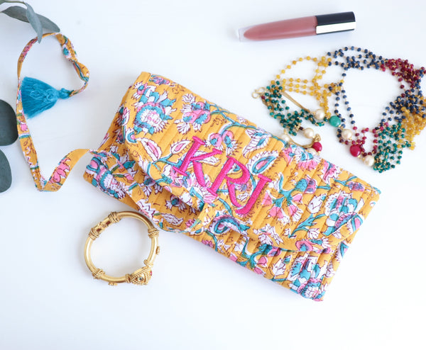 Personalized block print travel jewelry roll-up pouch with embroidered name
