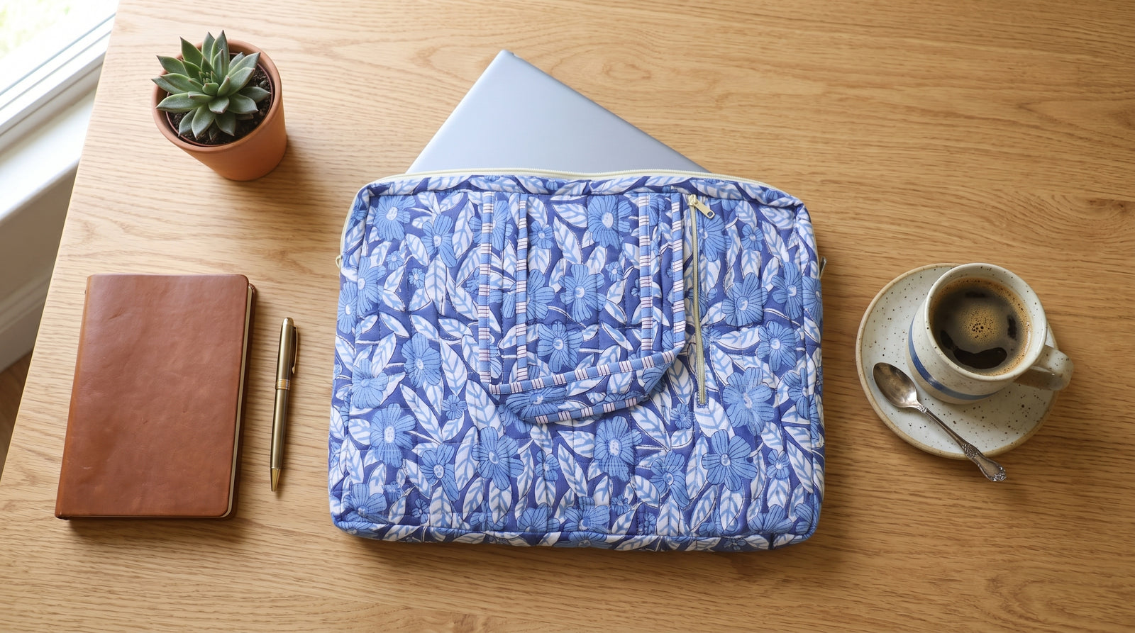 Blue Floral hand block-printed quilted cotton laptop bag by Kari by Kriti