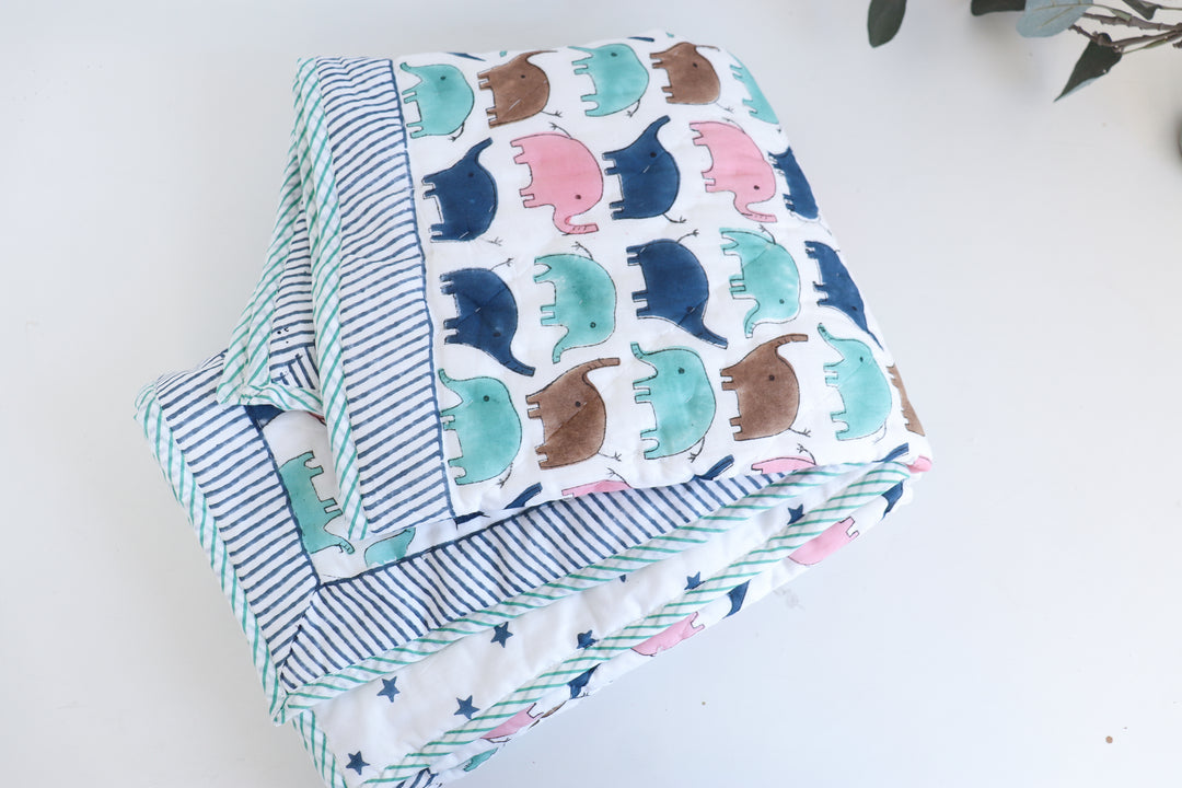 Personalised elephant Marching Jumbos block print baby quilt with name
