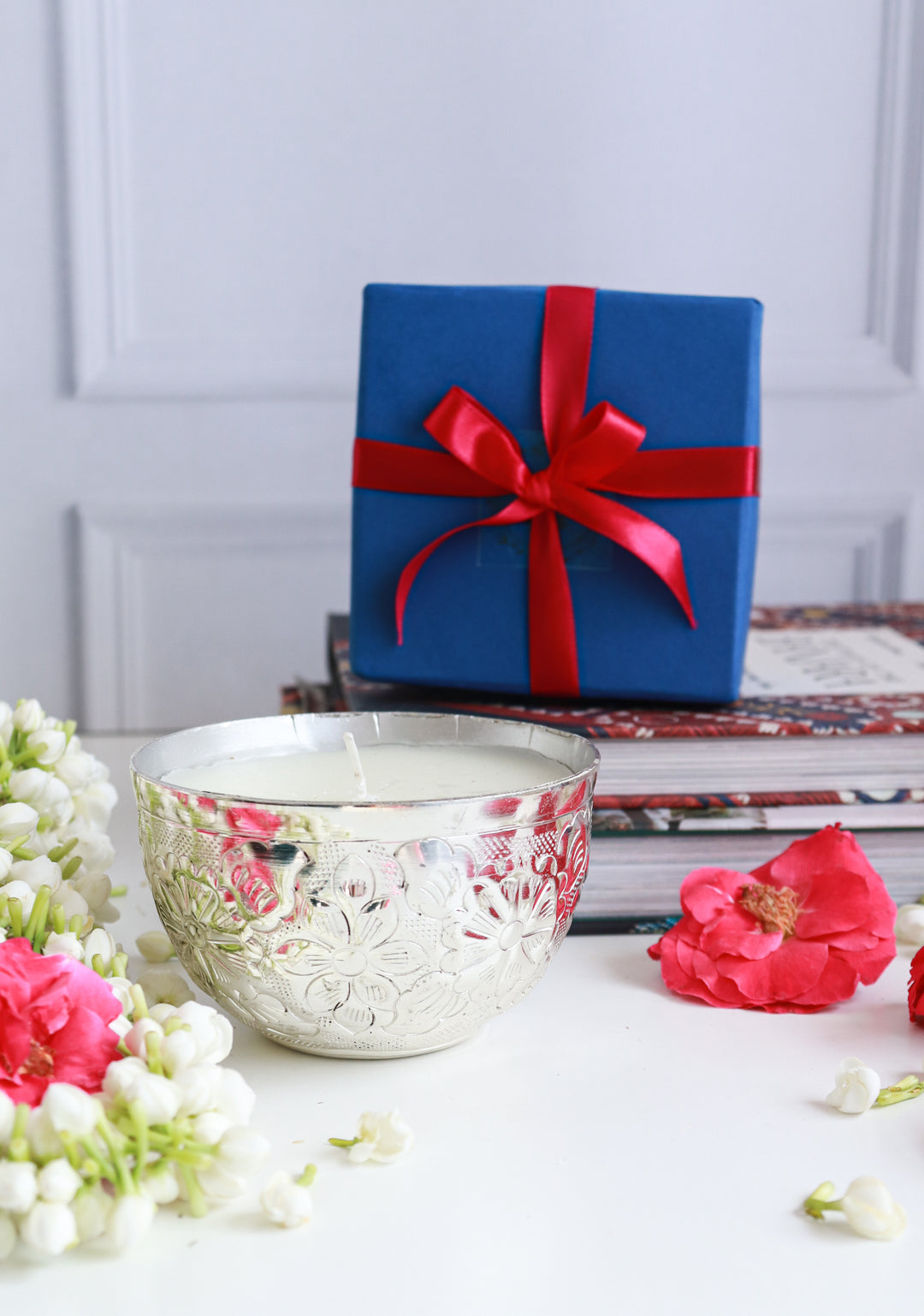 Silver embossed floral scented candle with mogra fragrance in a gift box

