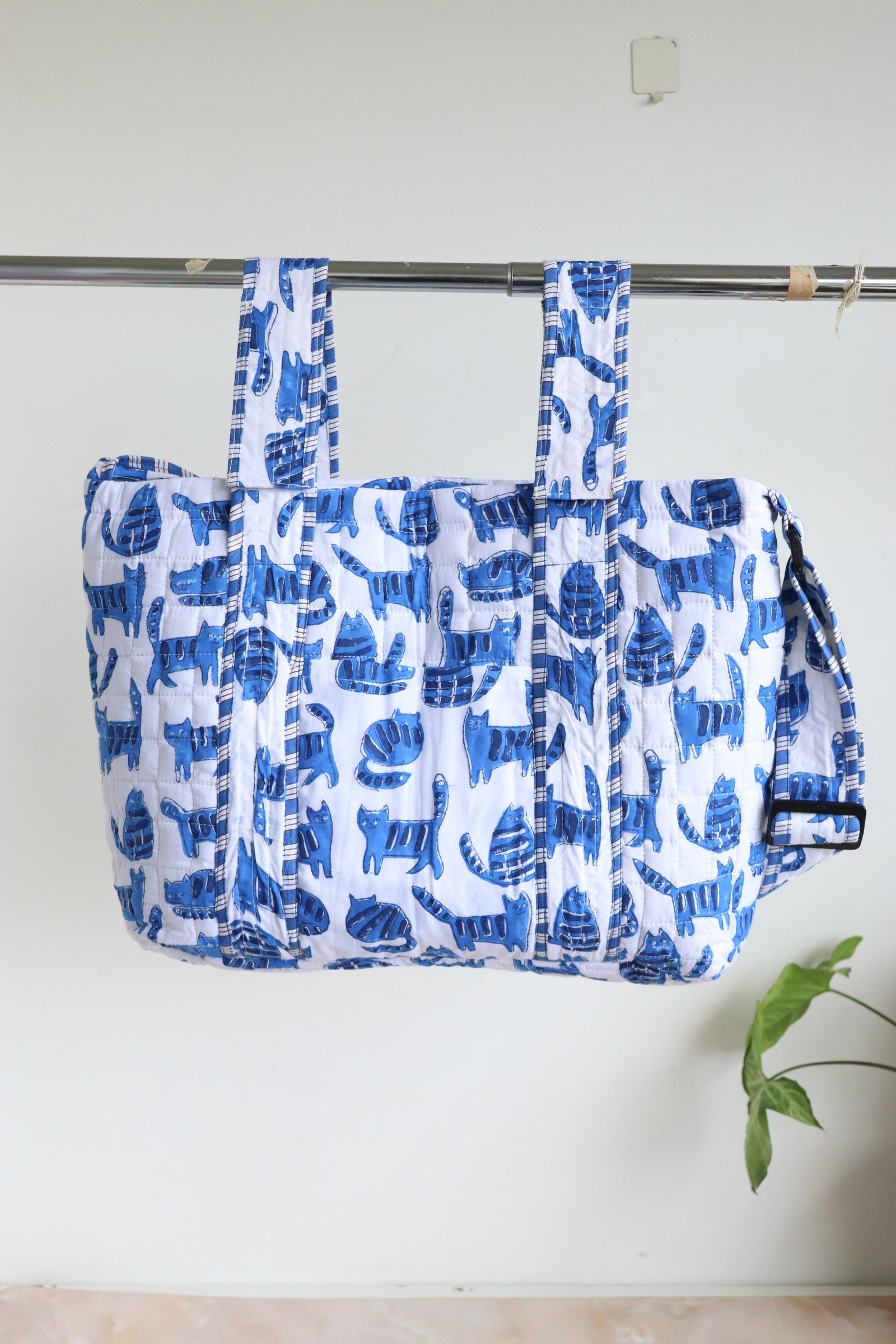 Personalized baby diaper bag in blue cat block print with custom name, stroller friendly, by Kari by Kriti
