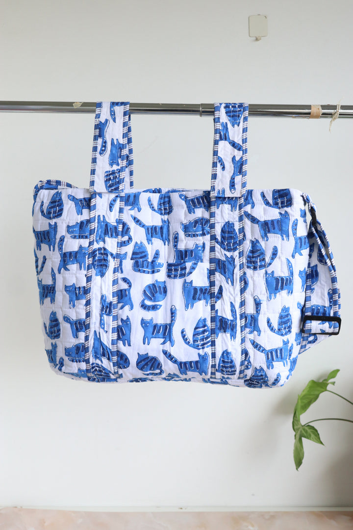 Personalized baby diaper bag in blue cat block print with custom name, stroller friendly, by Kari by Kriti
