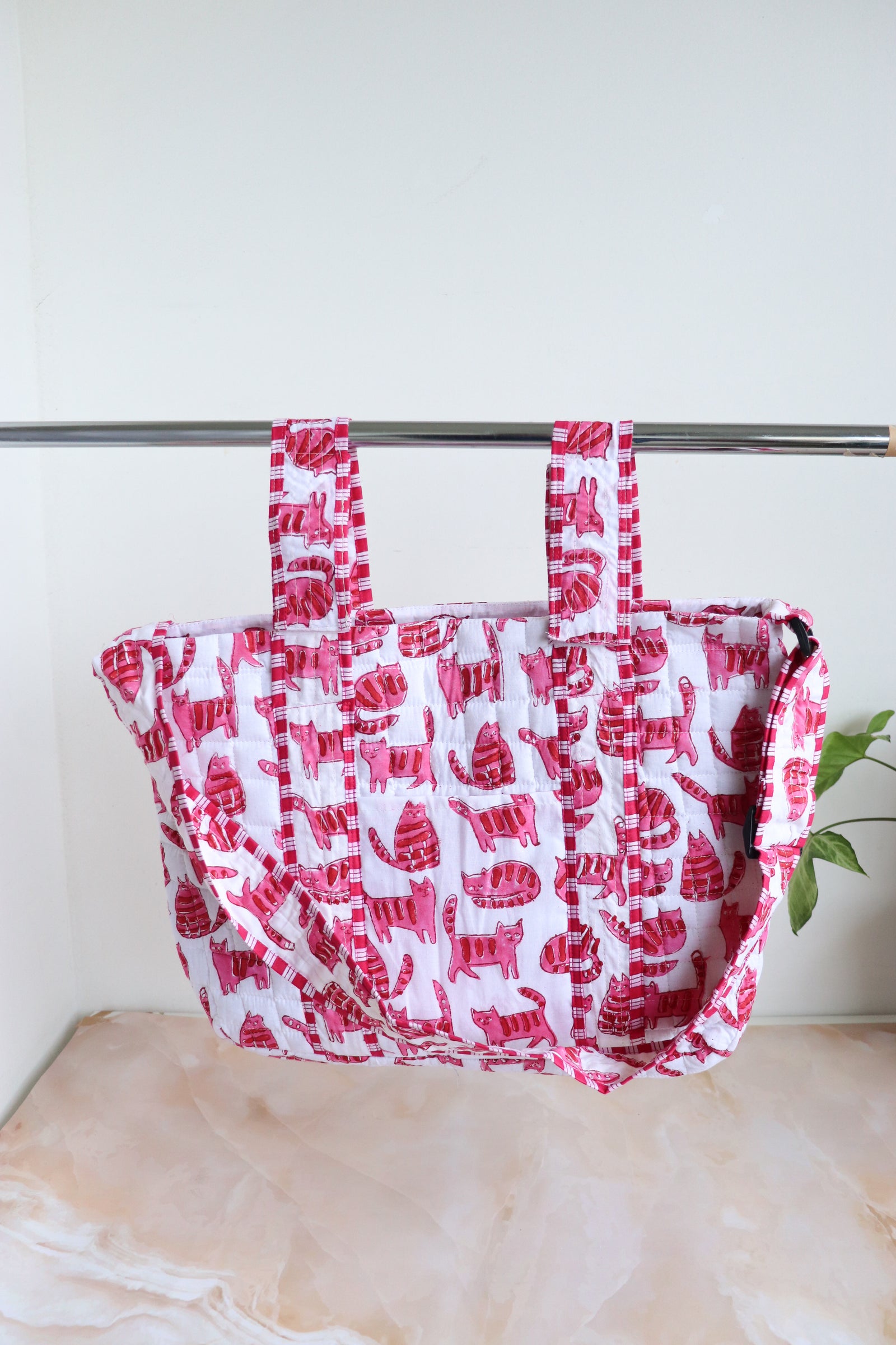Personalized baby diaper bag in pink cat block print with custom name, stroller friendly, by Kari by Kriti
