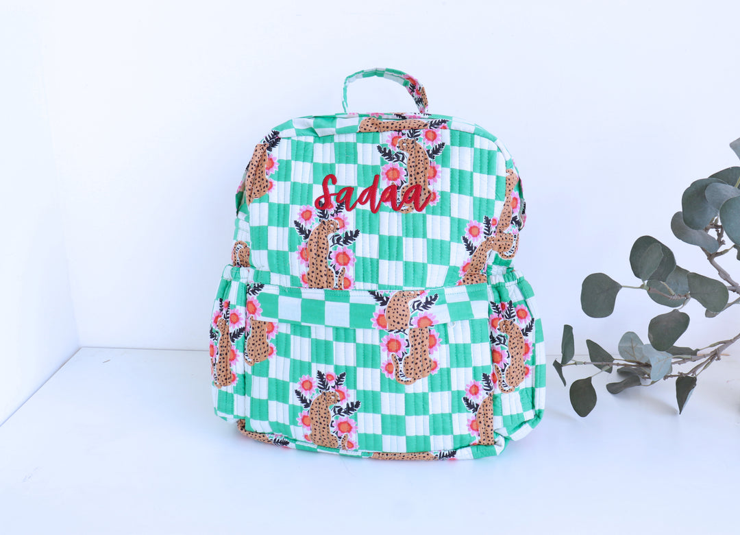 Personalised pink cheetah print quilted kids backpack with custom name
