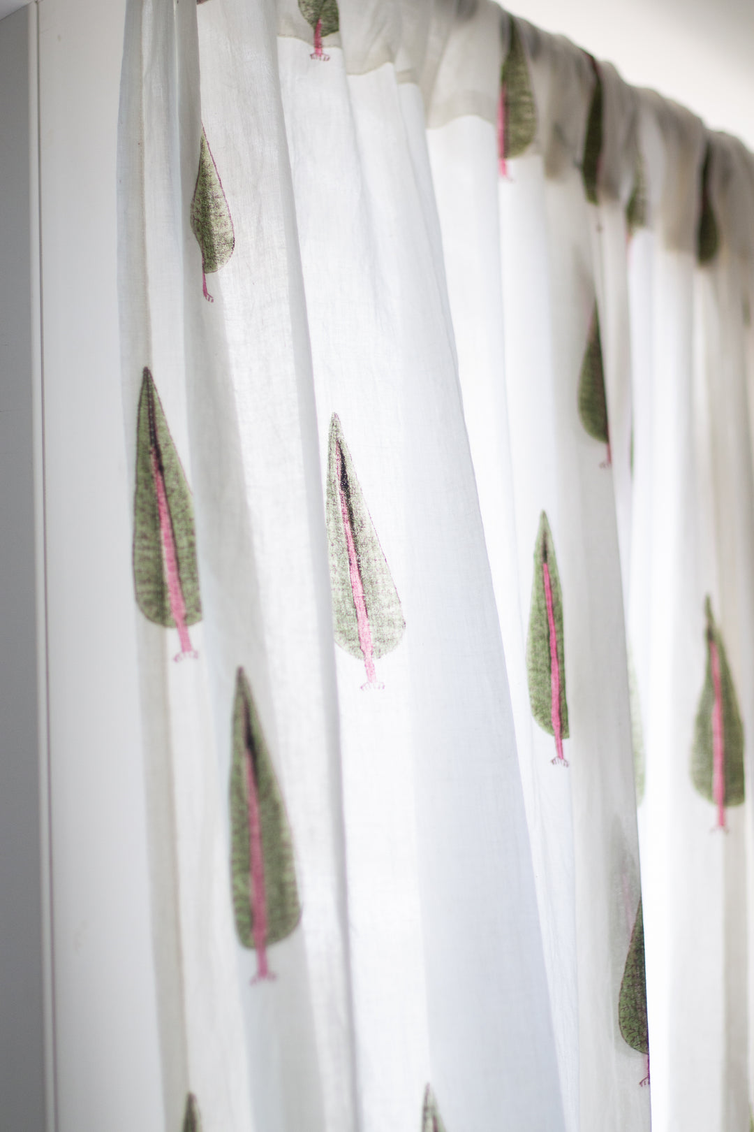 Cypress tree with pink floral block print sheer curtain in mulmul cotton
