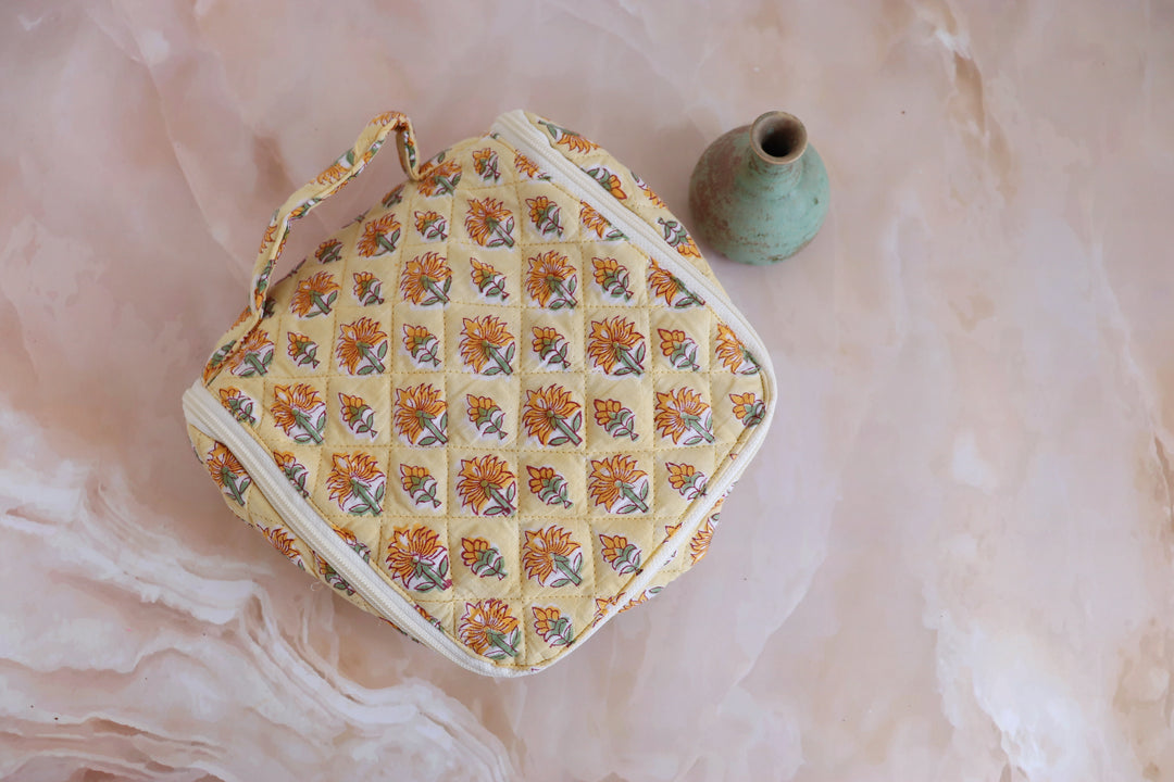 Personalized block print hanging travel bag with embroidered name
