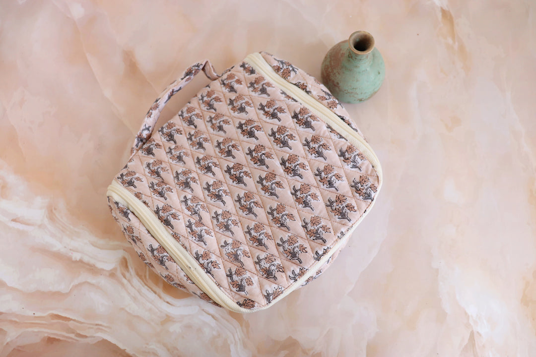 Personalized block print hanging travel bag with embroidered name
