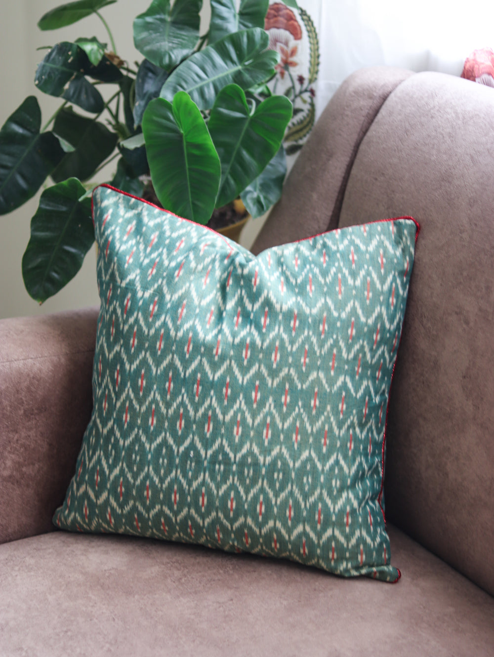 Housewarming gift set with 2 Ikat cushion covers and metal tea light holders in gift bag
