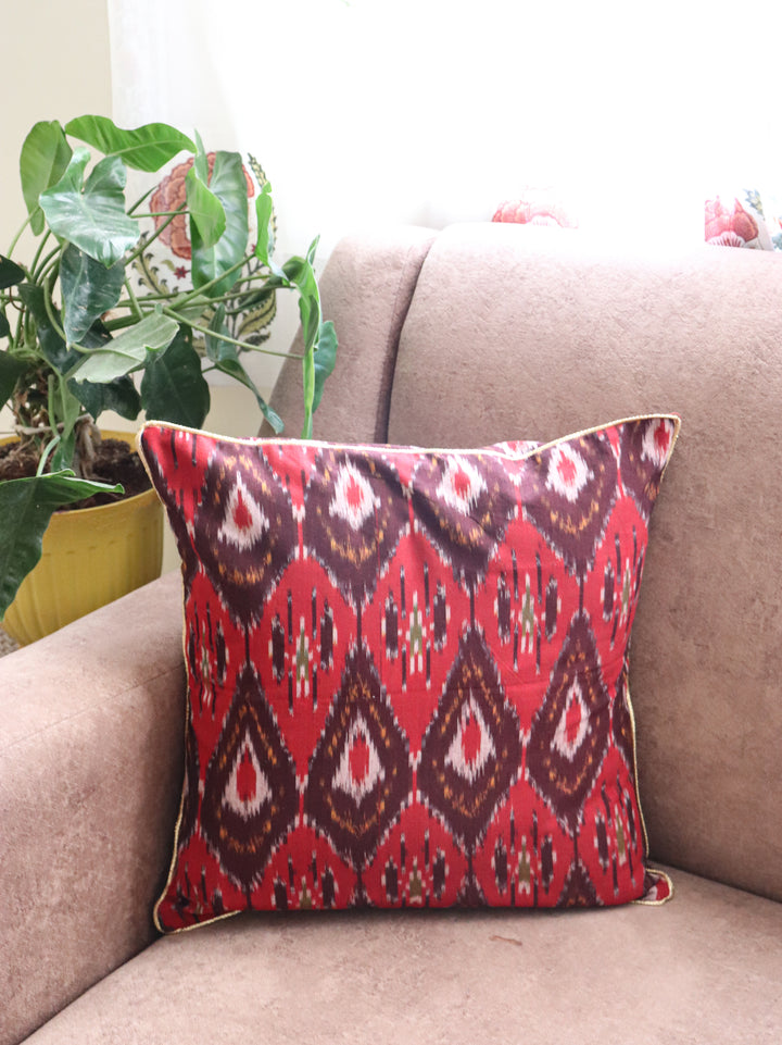 Housewarming gift set with 2 Ikat cushion covers and metal tea light holders in gift bag
