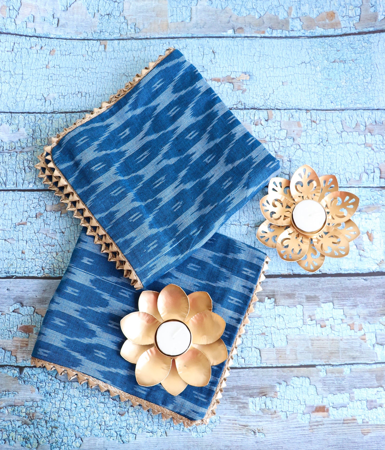 Housewarming gift set with 2 Ikat cushion covers and metal tea light holders in gift bag

