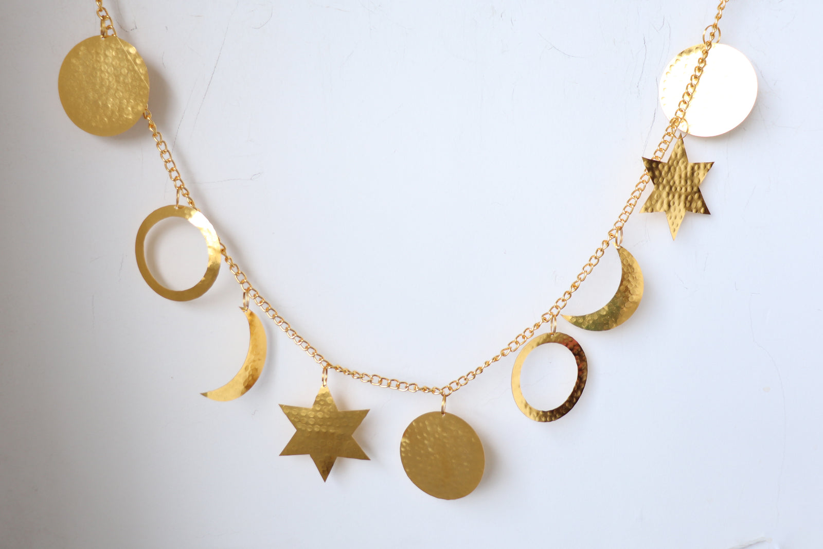 Handcrafted antique gold hammered metal toran Luna door hanging
