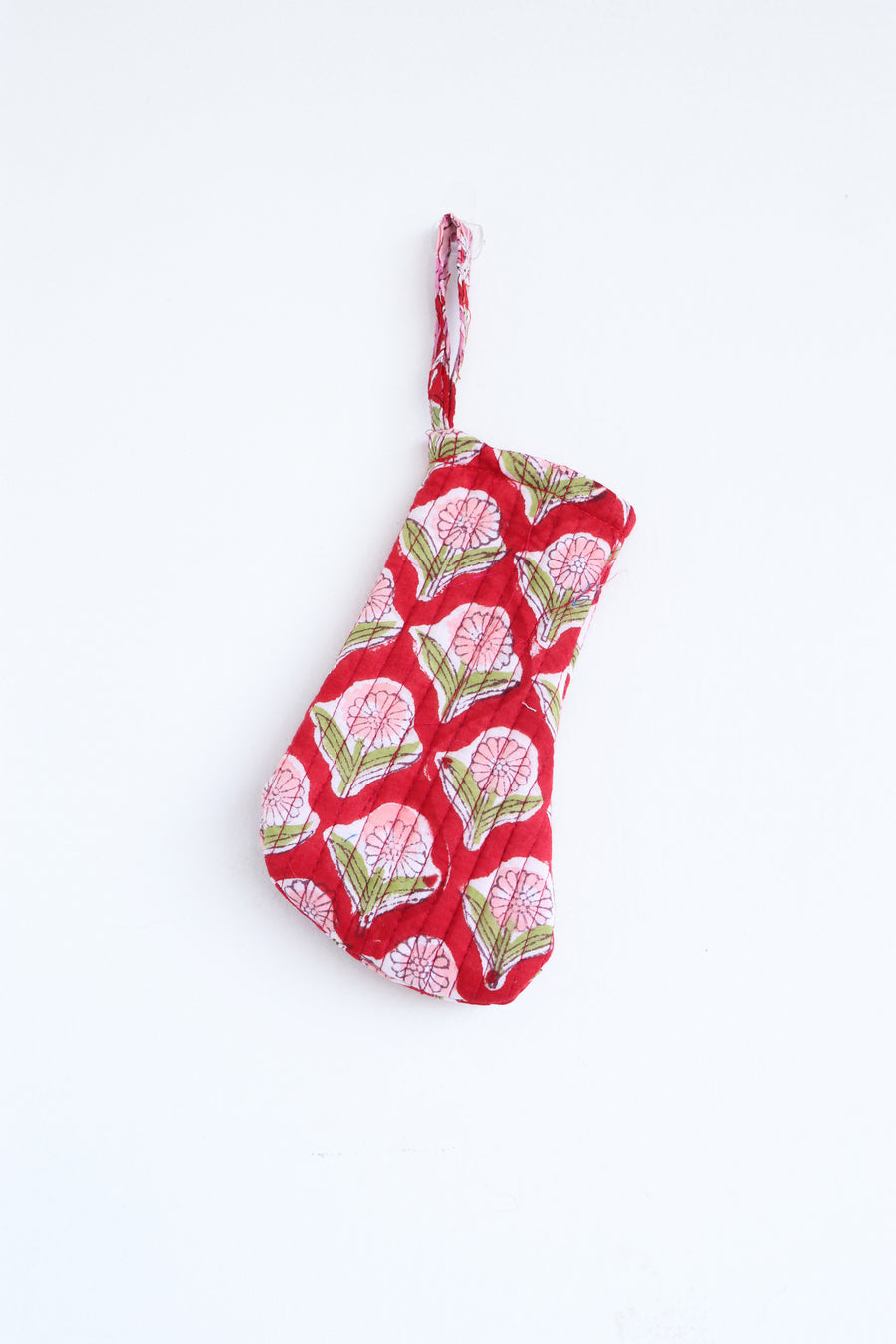 Mini quilted Christmas stocking in nutmeg block print
