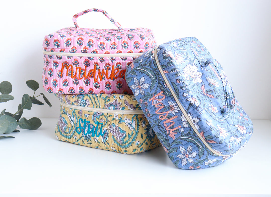 Personalized block print quilted vanity case with embroidered name in floral print
