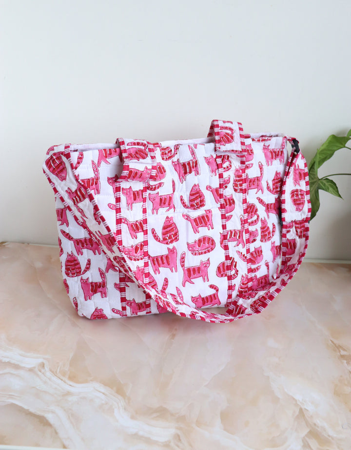 Personalized baby diaper bag in pink cat block print with custom name, stroller friendly, by Kari by Kriti

