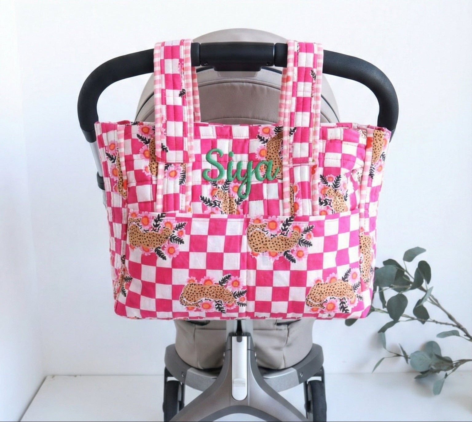 Personalized baby diaper bag in pink cheetah block print with custom name, stroller friendly, by Kari by Kriti
