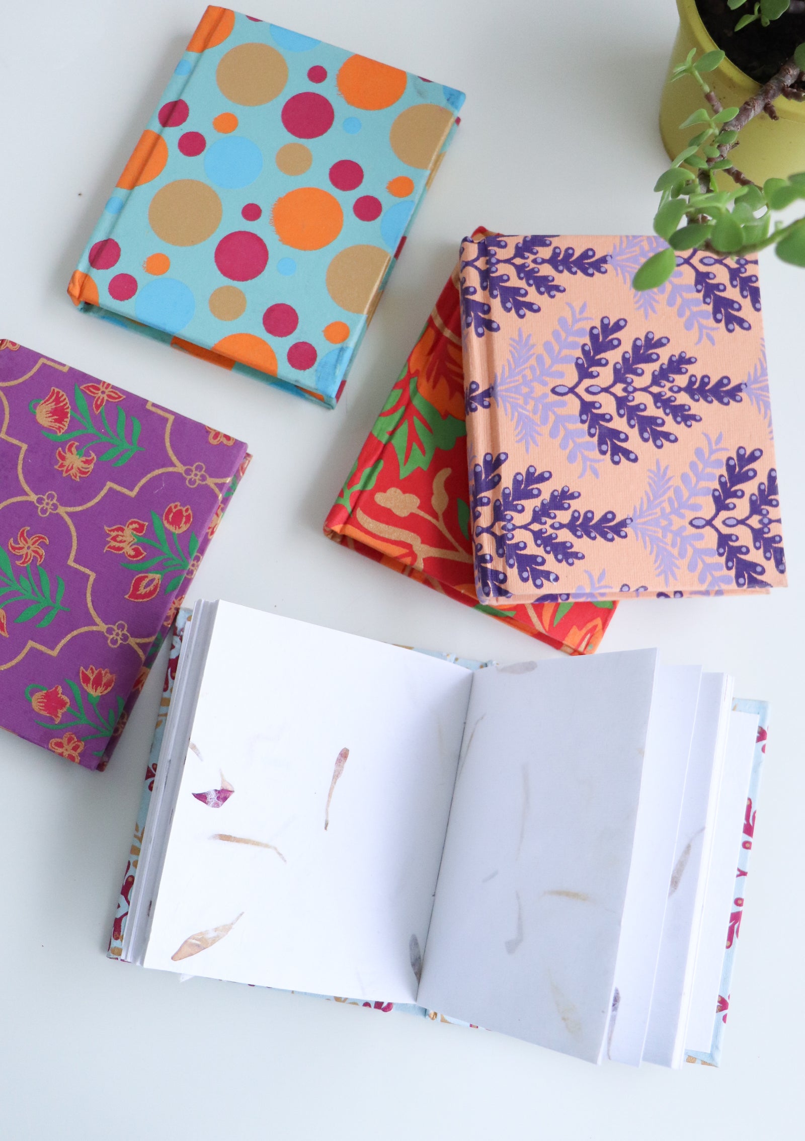 Assorted block print recycled paper notebooks in bulk
