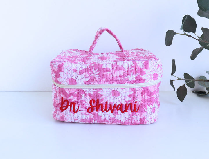 Personalized block print quilted vanity case with embroidered name in floral print
