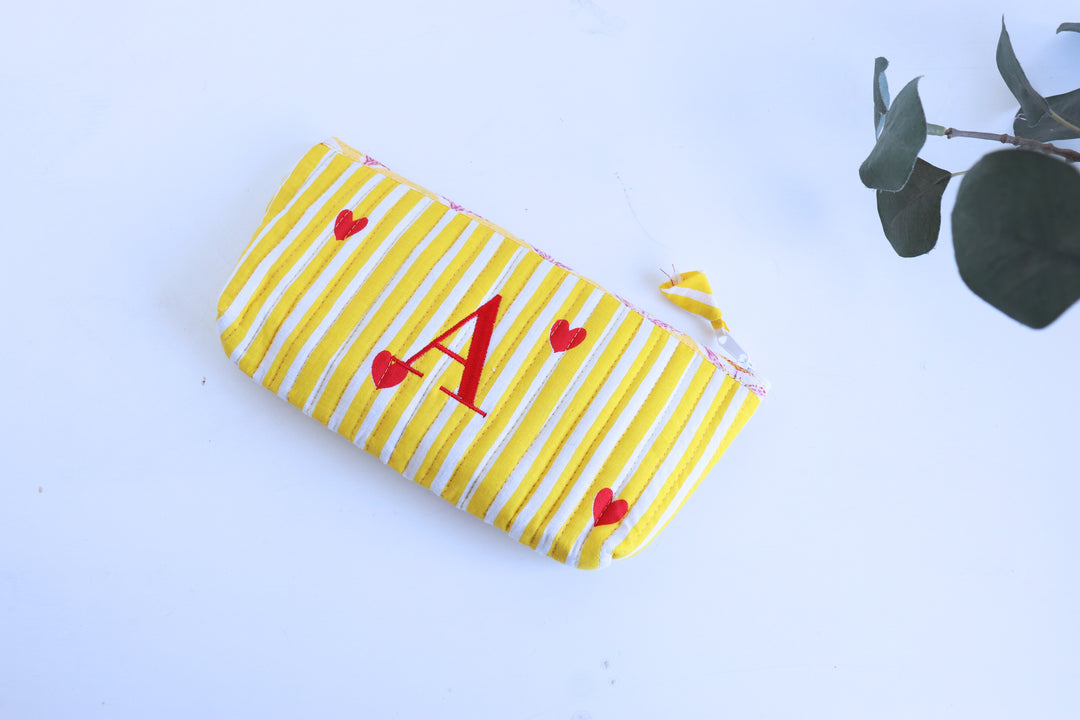 Block print quilted pencil pouch with embroidered initials

