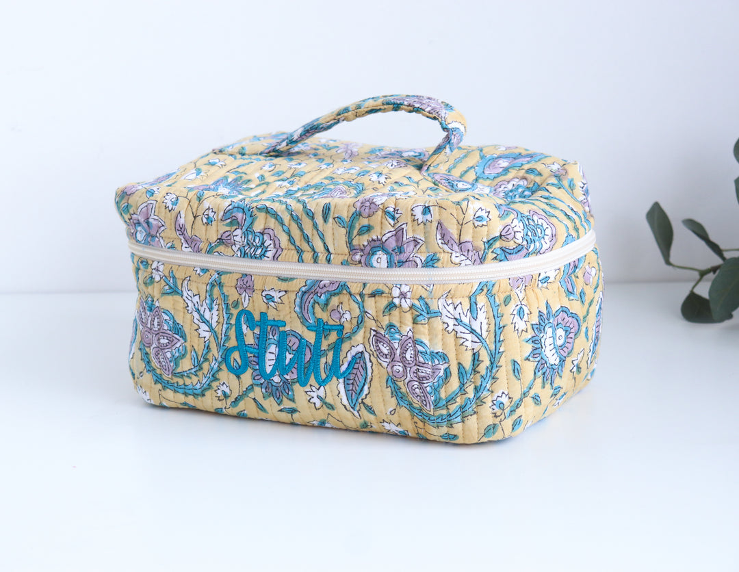 Personalized block print quilted vanity case with embroidered name in floral print
