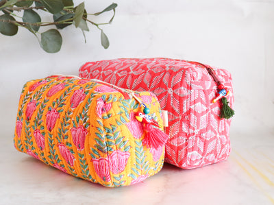 set of 2 cosmetic pouches in pink and yellow