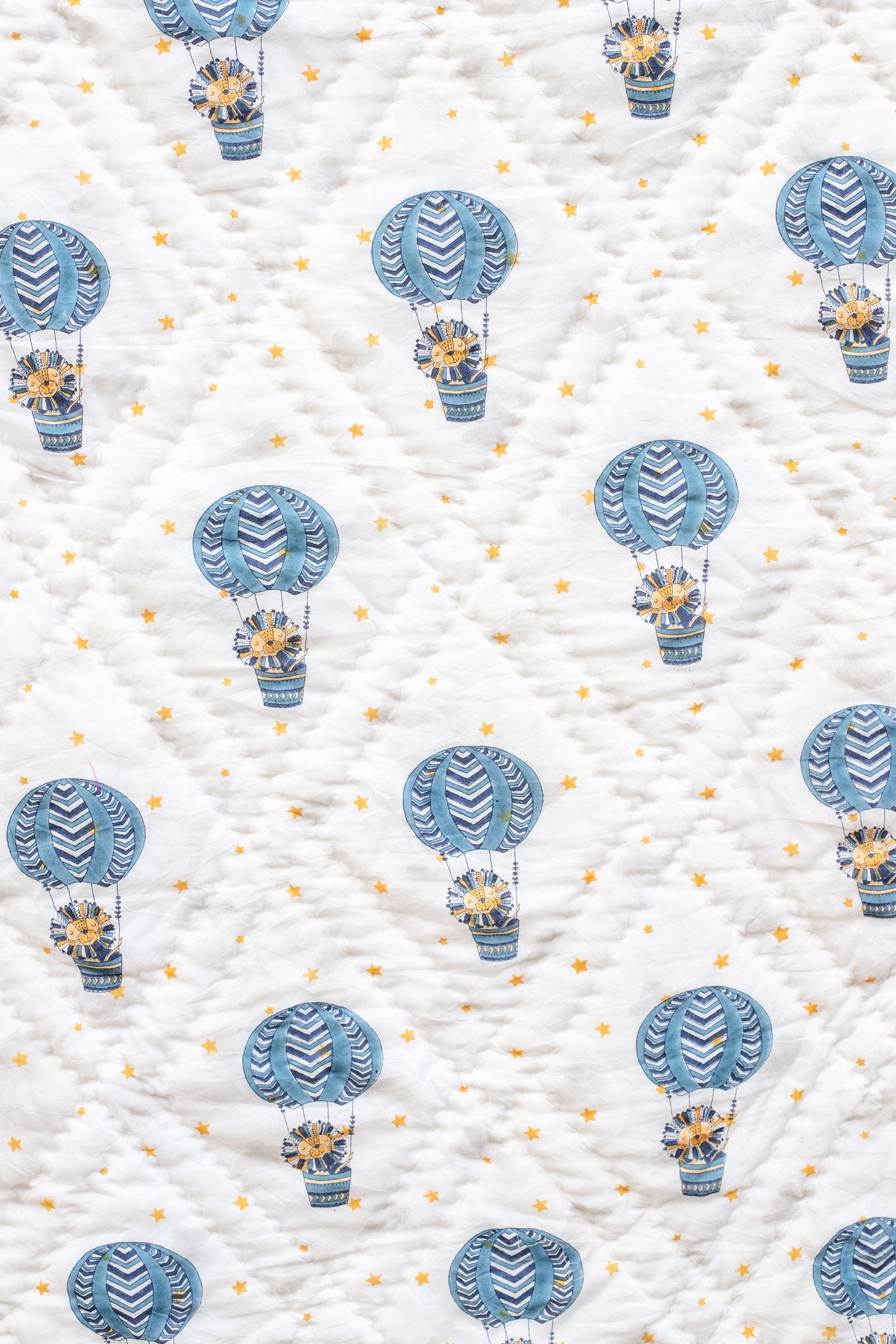 Blue lion block print baby quilt, handmade cotton nursery bedding by Kari by Kriti
