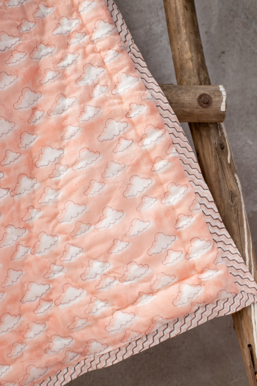 Personalised pink and yellow lion block print baby quilt with name
